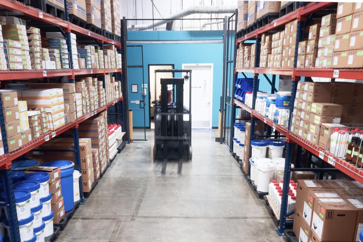 Image of shelving in Tanvex's GMP warehousing facility