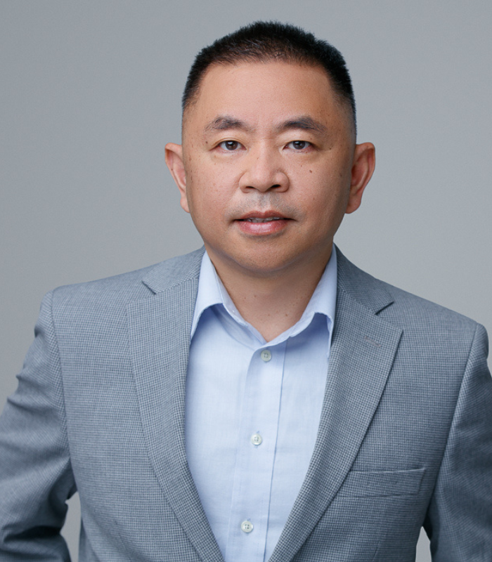 Headshot of Weifeng "Frank" Zhang, Vice President of Manufacturing and Manufacturing Science and Technology (MSAT) at Tanvex.